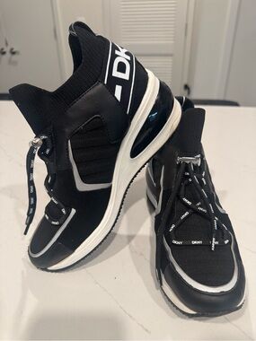 DKNY Women’s Black and White High-Top Slip-On Sneakers